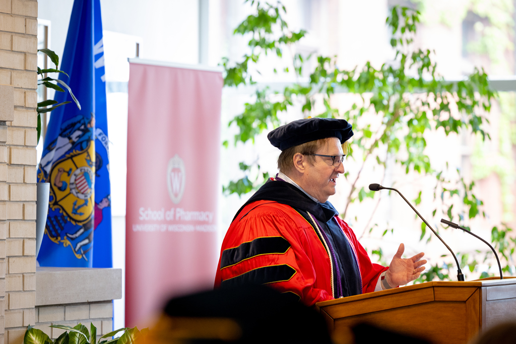 Dean Steve Swanson speaks at the podium