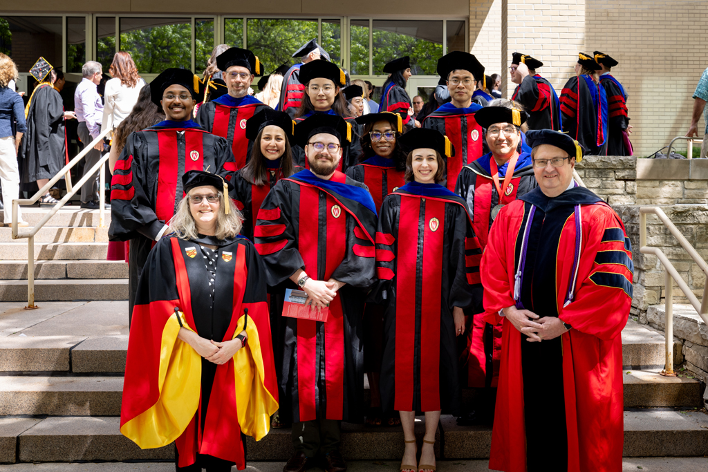 PharmSci graduates and faculty pose for a photo