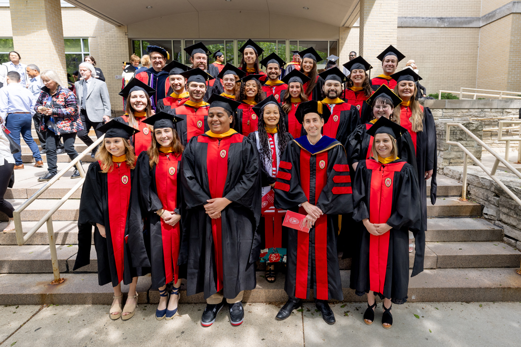 MS in psychoactive pharmaceutical investigation graduates pose for a photo with Assistant Professor Cody Wenthur