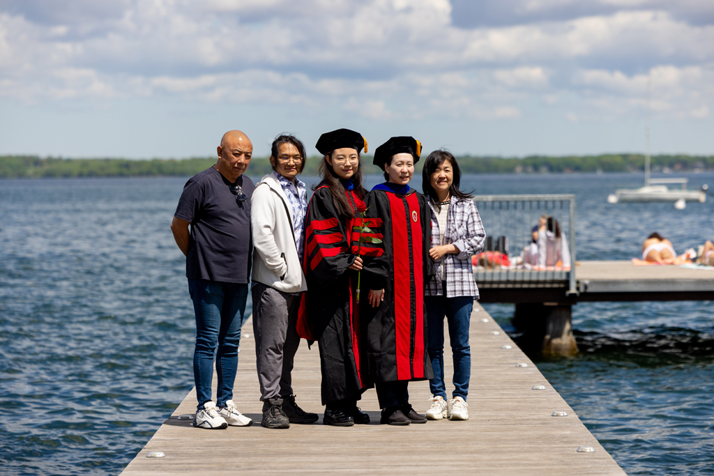 Jiaoyang Jiang poses with a graduate