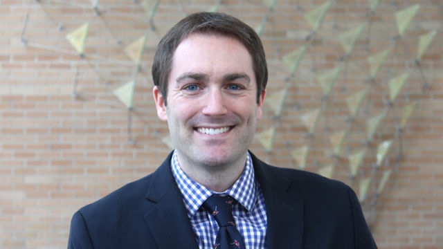 headshot of Warren Rose