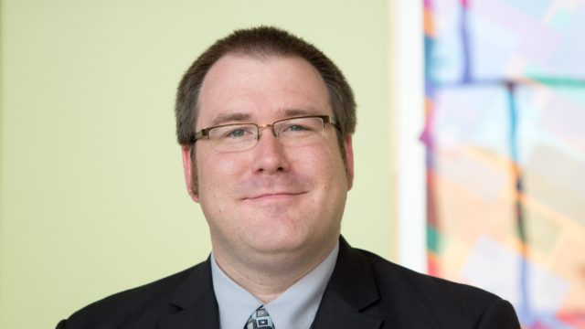 headshot of Ryan Miller