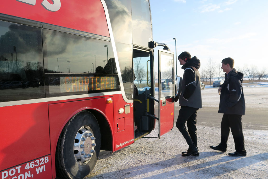 Students getting onto Badger Coaches bus