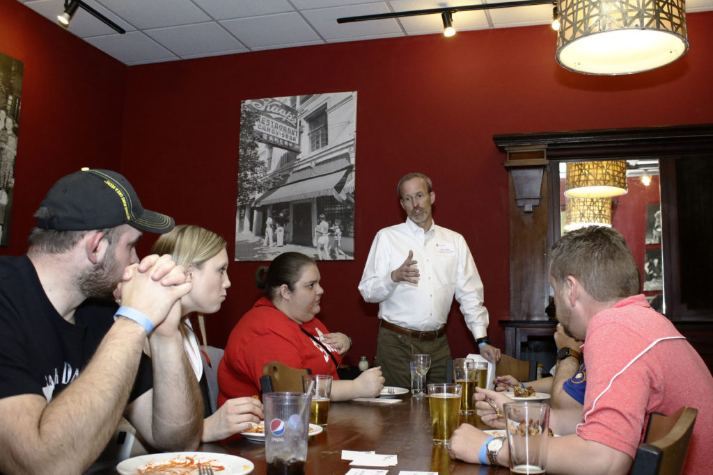 Professor David Mott leads the discussion among alumni.