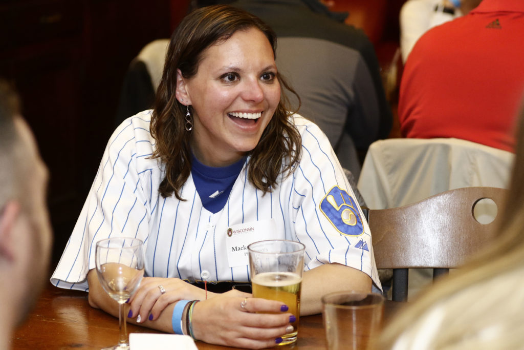 Alumni wearing baseball jersey
