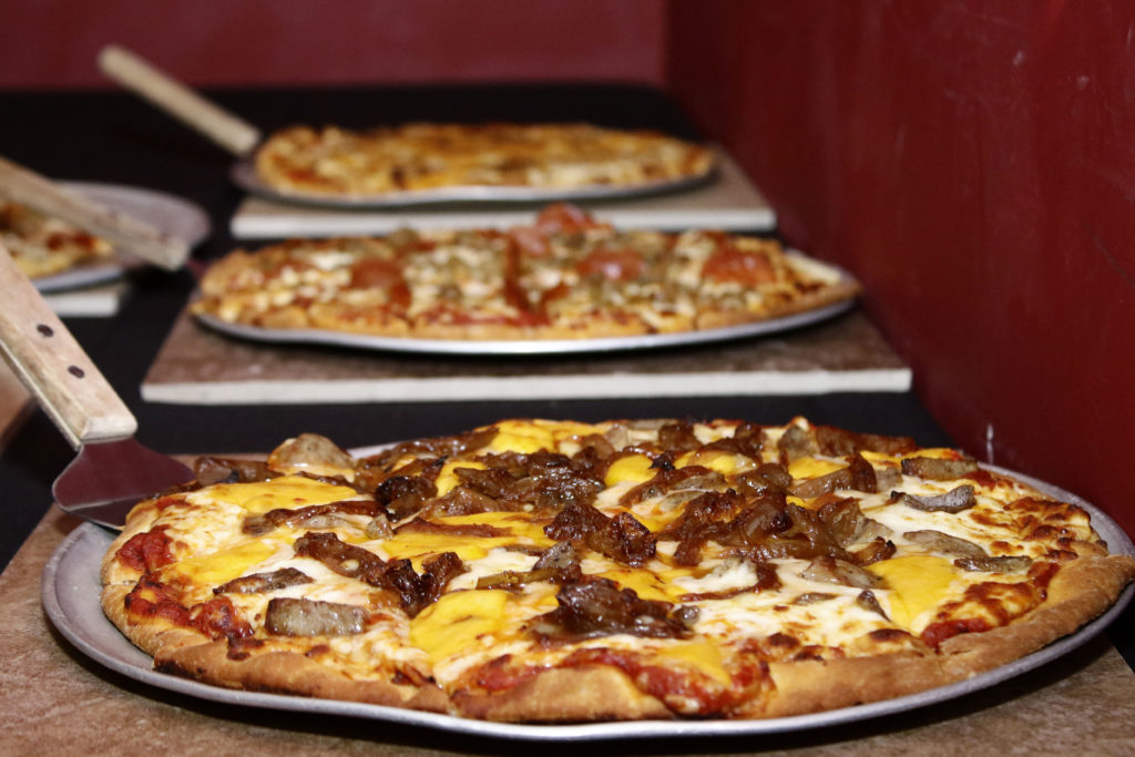 Pizzas laid out.