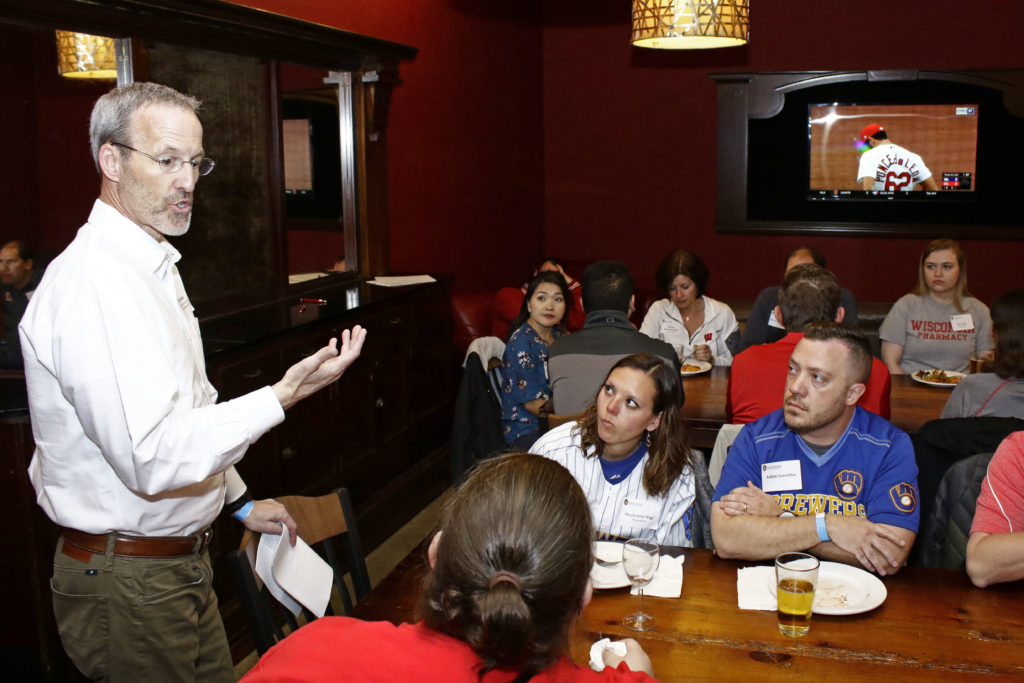 Professor David Mott leads the discussion among alumni.
