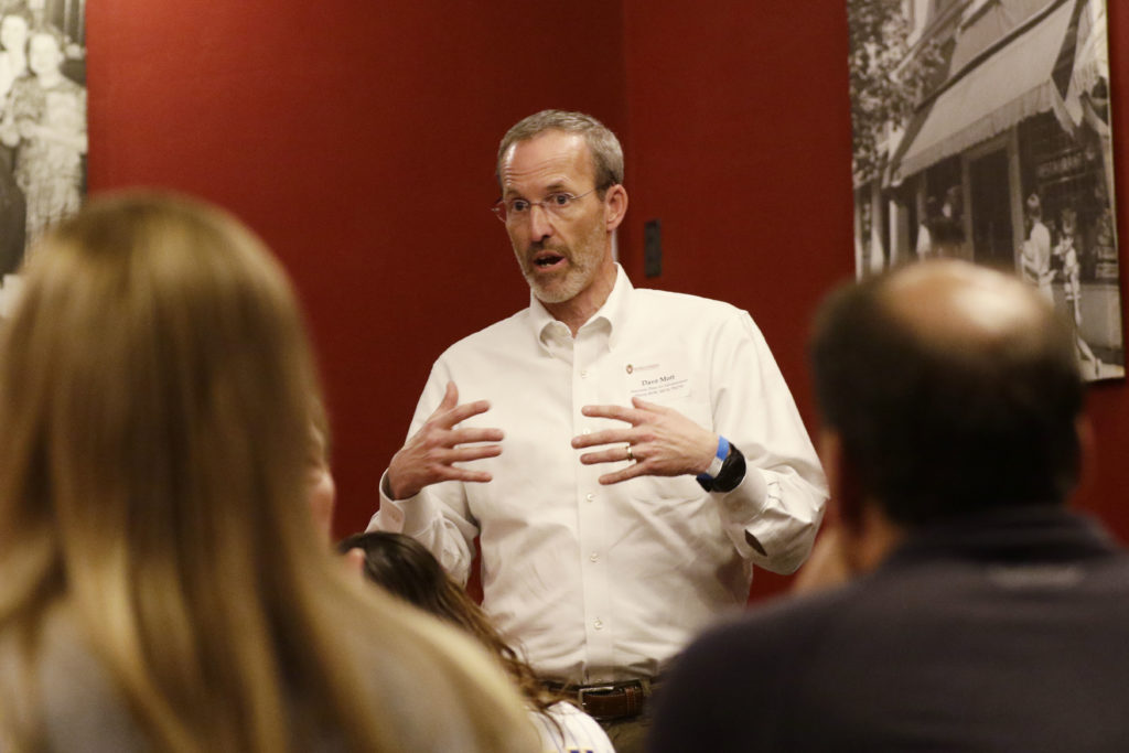 Professor David Mott leads the discussion among alumni.