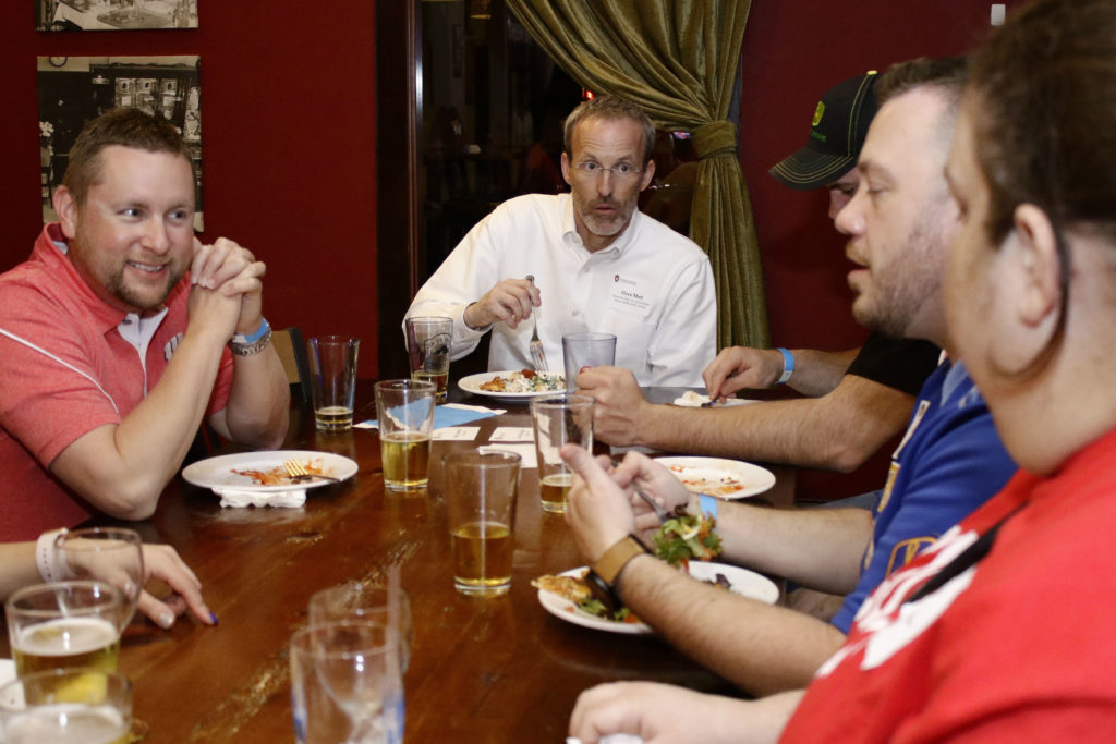Professor David Mott leads the discussion among alumni.