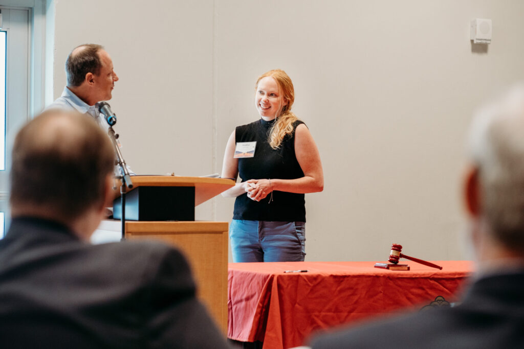 Jason Lau speaking to new PAA president Heather Spatchek.