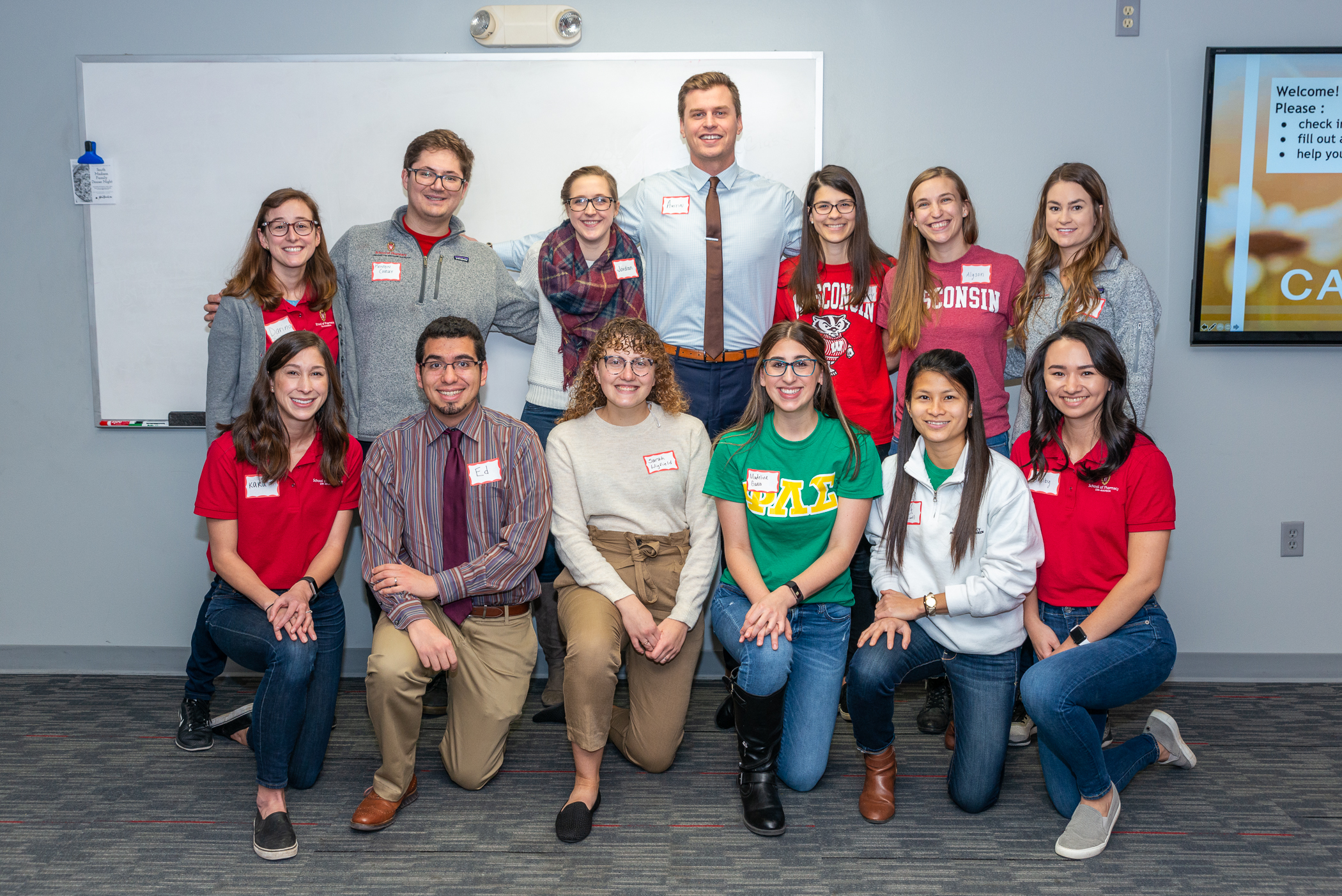 Group photo of students in PLS with Assistant Professor Ed Portillo at the caregiver training.