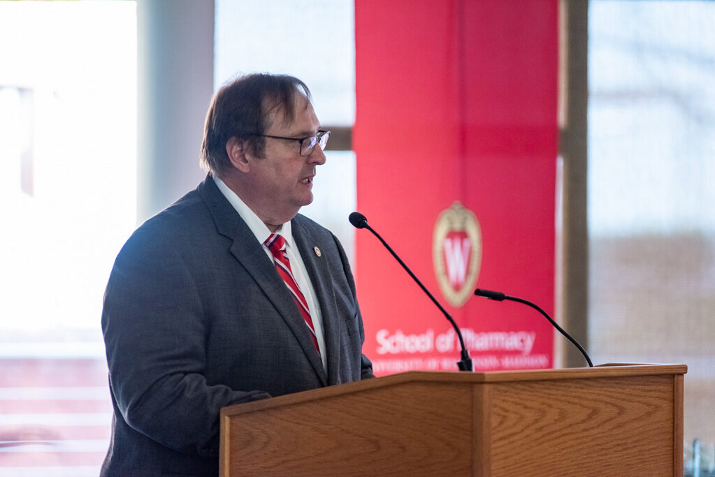 Steve Swanson speaking at the podium