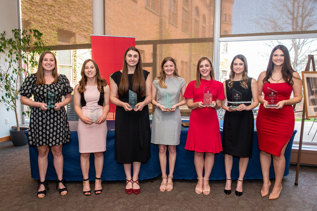 UW Pharm Award recipients holding their award