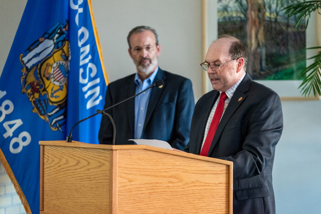 Man speaking at podium