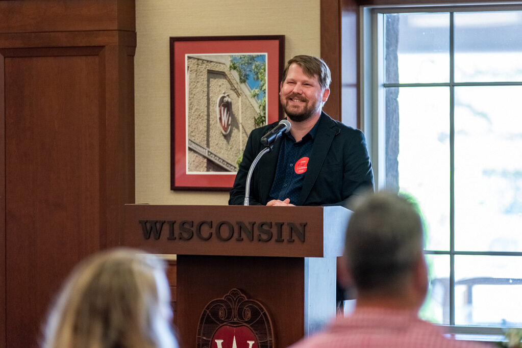 faculty speaking at the podium