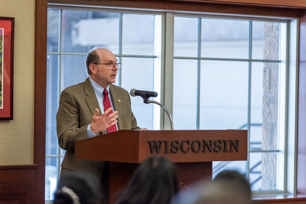 faculty speaking at the podium