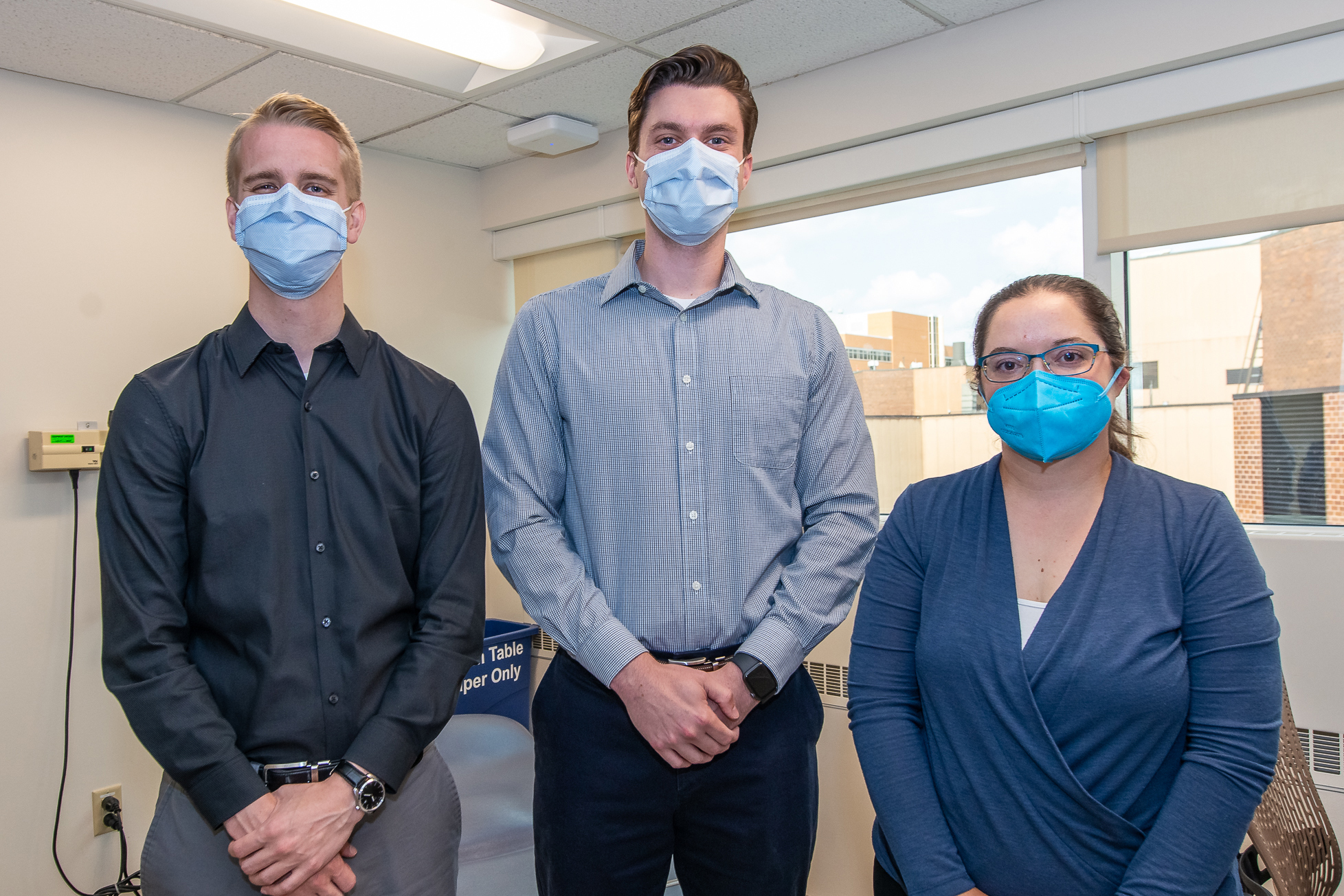 Tyler Albright (PharmD ‘21), Ryan Simonet (PharmD '19), and Assistant Professor Amanda Margolis (PharmD '09, MS '17) in a clinic room in the William S. Middleton Memorial Veterans Hospital. | Photo by Ingrid Laas