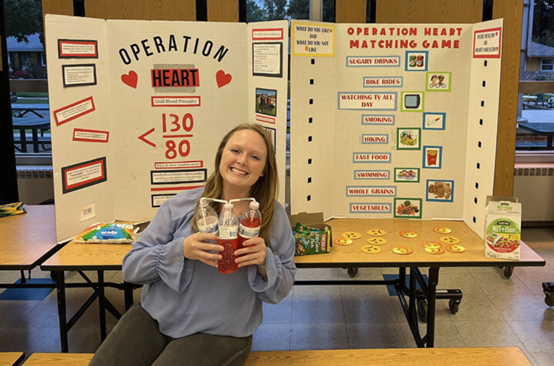 PharmD student Kelsie Tingle presents about heart health at a Lincoln Elementary School health fair.