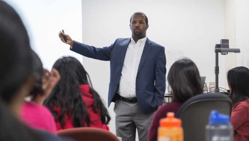 Ephrem Abebe presenting to current students.