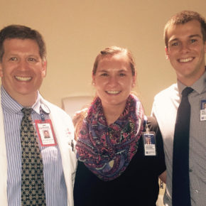 Dr. Patrick Dowling, Laura Josephson, and Alex Hall standing together smiling