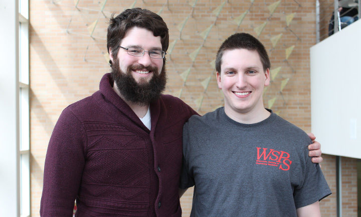 2nd year pharmacy students Noah Budi (left) and Collin Dean (right) stand together in Rennebohm Hall