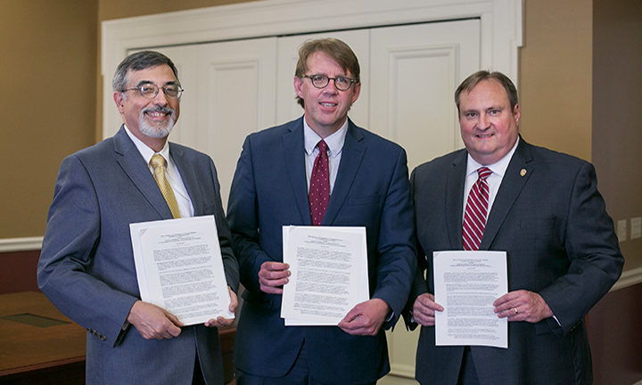 AIHP and WHS representatives sign an Memorandum of Understanding (MOU) at the Wisconsin Historical Society in Madison, Wisconsin on June 16, 2017 : Greg Higby, Matthew Blessing, Dean Steven M. Swanson