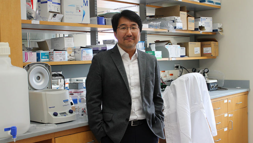 Seungpyo Hong standing in his lab