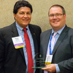 Rocky LaDien and Ryan Miller with his award
