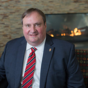 Steve Swanson sitting in a chair