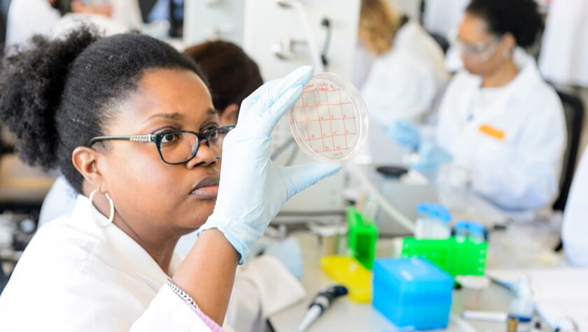 Student reviewing a test in a lab.