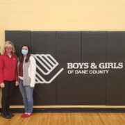 Associate Professor Olayinka Shiyanbola, Professor Beth Martin, and Assistant Professor Marina Maes volunteer at the vaccination clinic at the Boys & Girls Allied Club in Fitchburg.