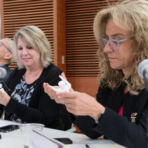 Roger Tung, Deb Fluno, and Azita Saleki-Gerhardt consider the MyDropper examples in their hands.