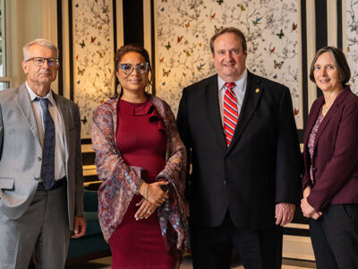 Evgenyi Shalaev, Yolanda Tolson, Steve Swanson, and Lynne Taylor pose for a photo