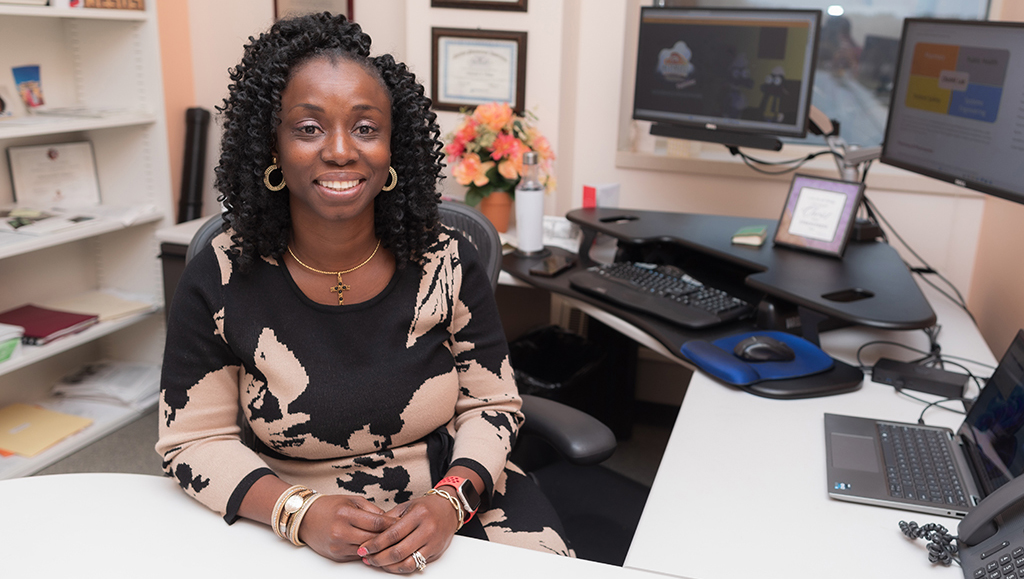 Olufunmilola Abraham at her desk