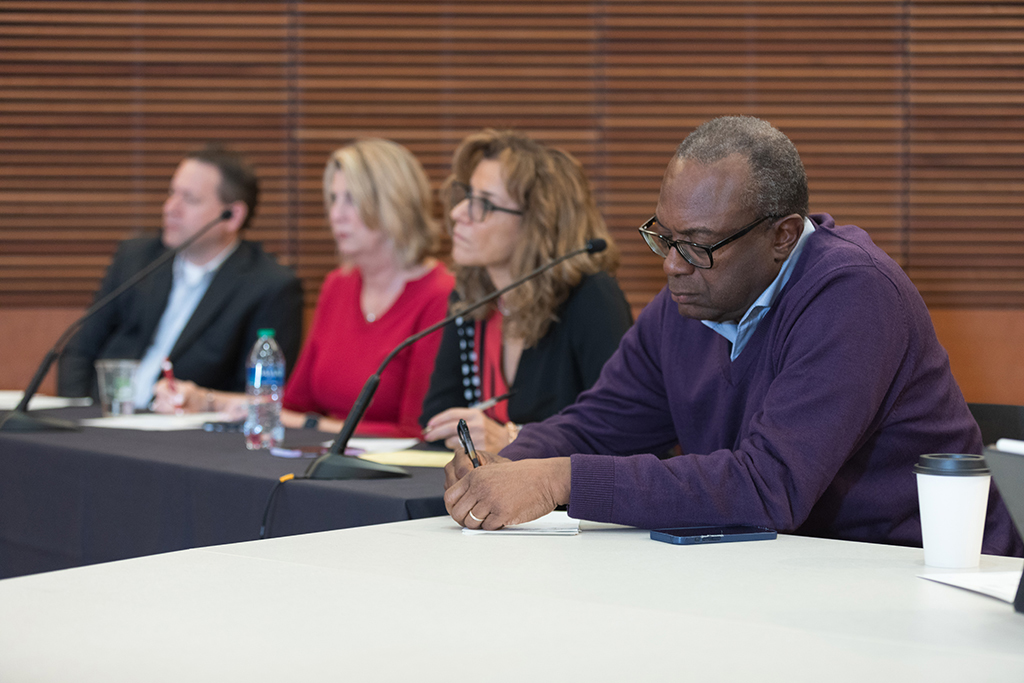 Brent Eberle, Debra Fluno, Azita Saleki Gerhardt, and Bruce Scott at a table