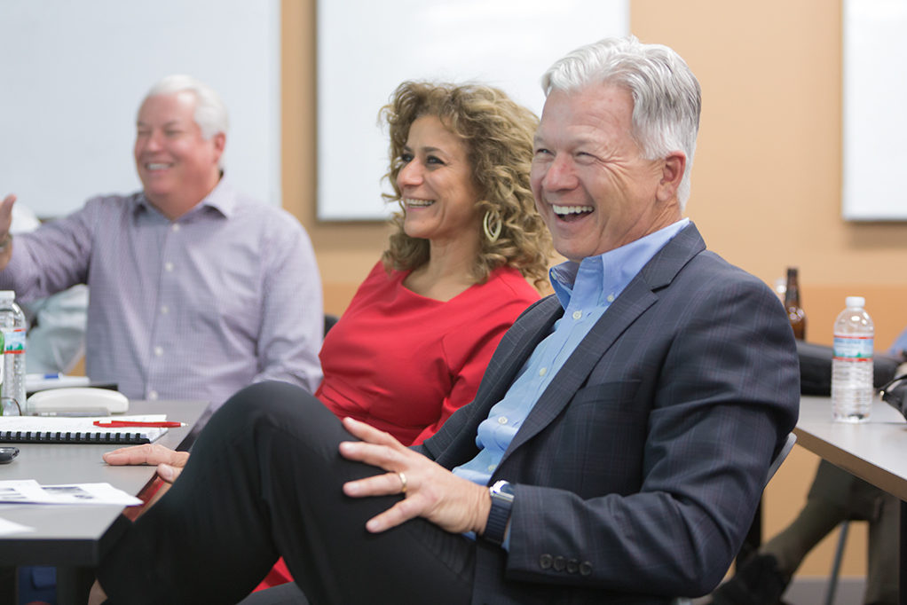 Dan Luce, Azita Saleki-Gerhardt, and George Zorich laughing on panel