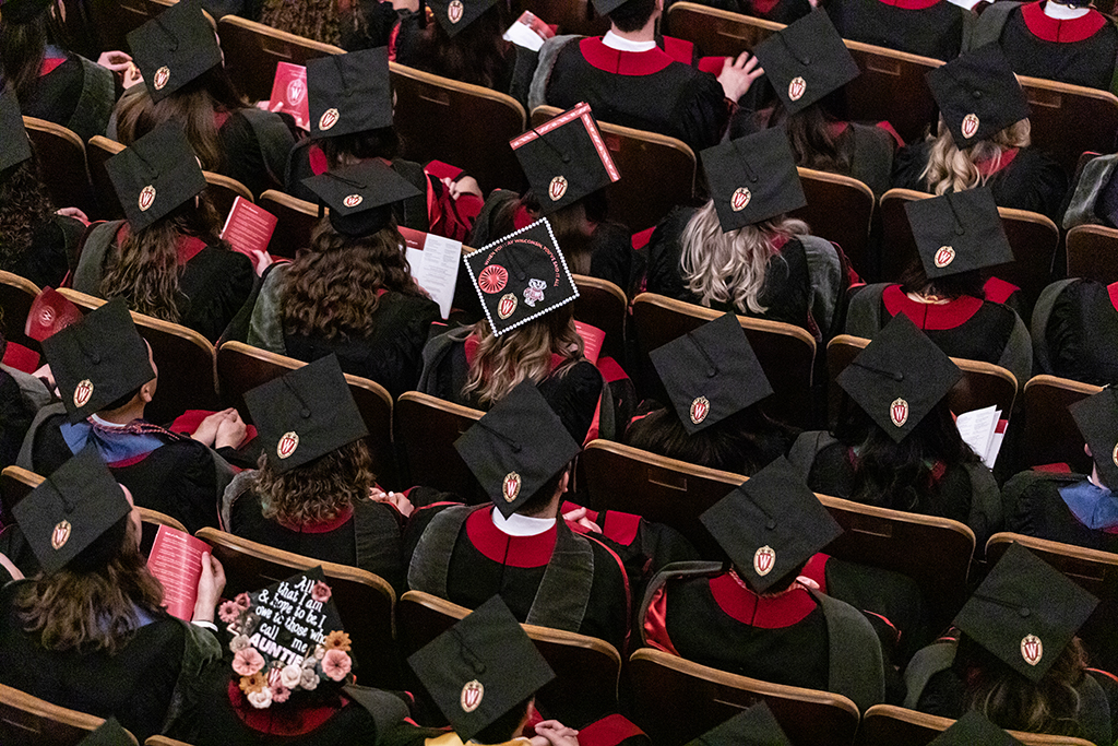 Overhead shot of graduate caps at 2022 SoP Hooding Ceremony