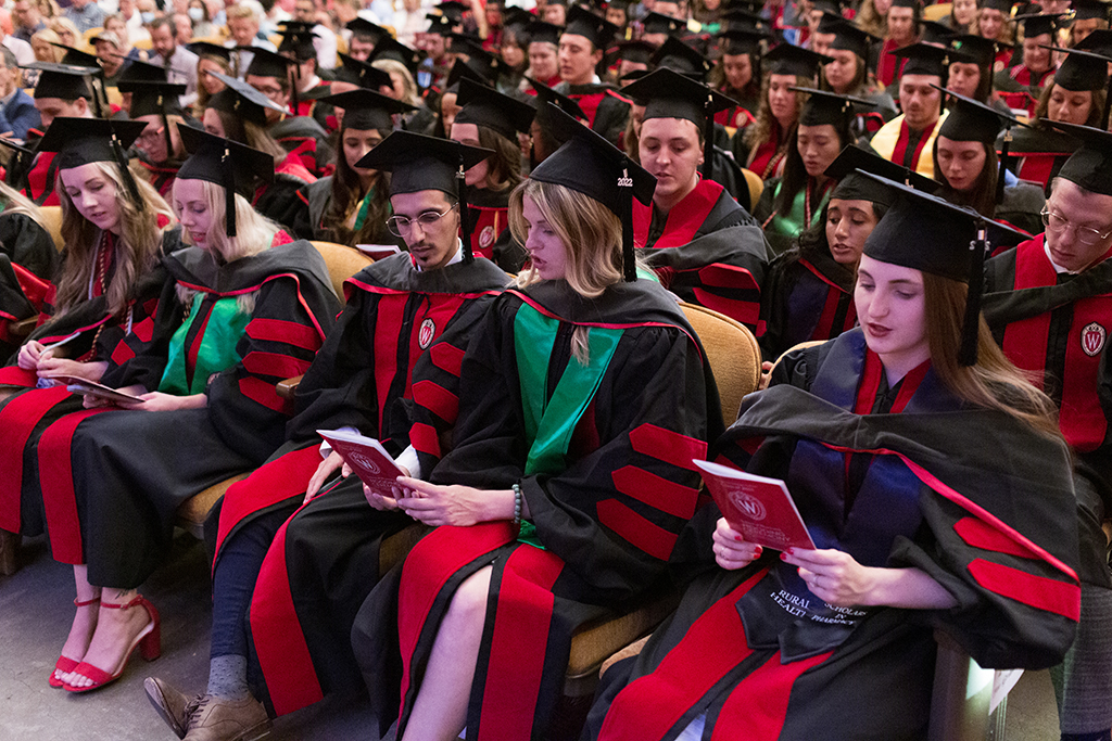 Class of 2022 PharmD graduates Maija Anderson, Megan Andraski, Assiri Bander, and Megan Avery read the Oath of a Pharmacist at the conclusion of the 2022 Hooding Ceremony