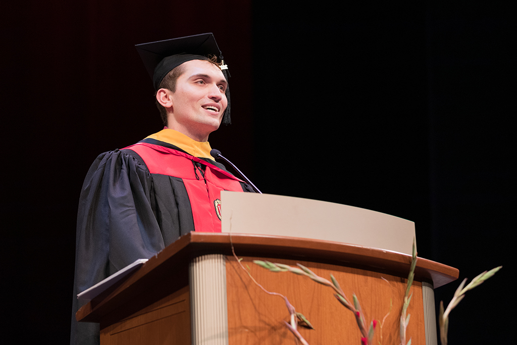 Herolind Jusufi (Pharmacy Master's Program) gives a talk at the 2022 School of Pharmacy Hooding Ceremony