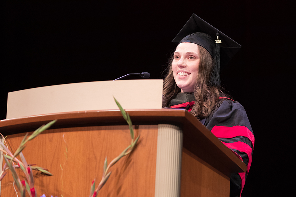 Kiah Tulibaski gives a speech at the 2022 School of Pharmacy Hooding Ceremony