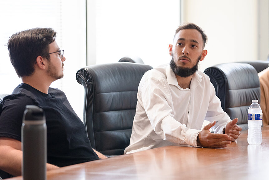 Staff member talking in a conference room