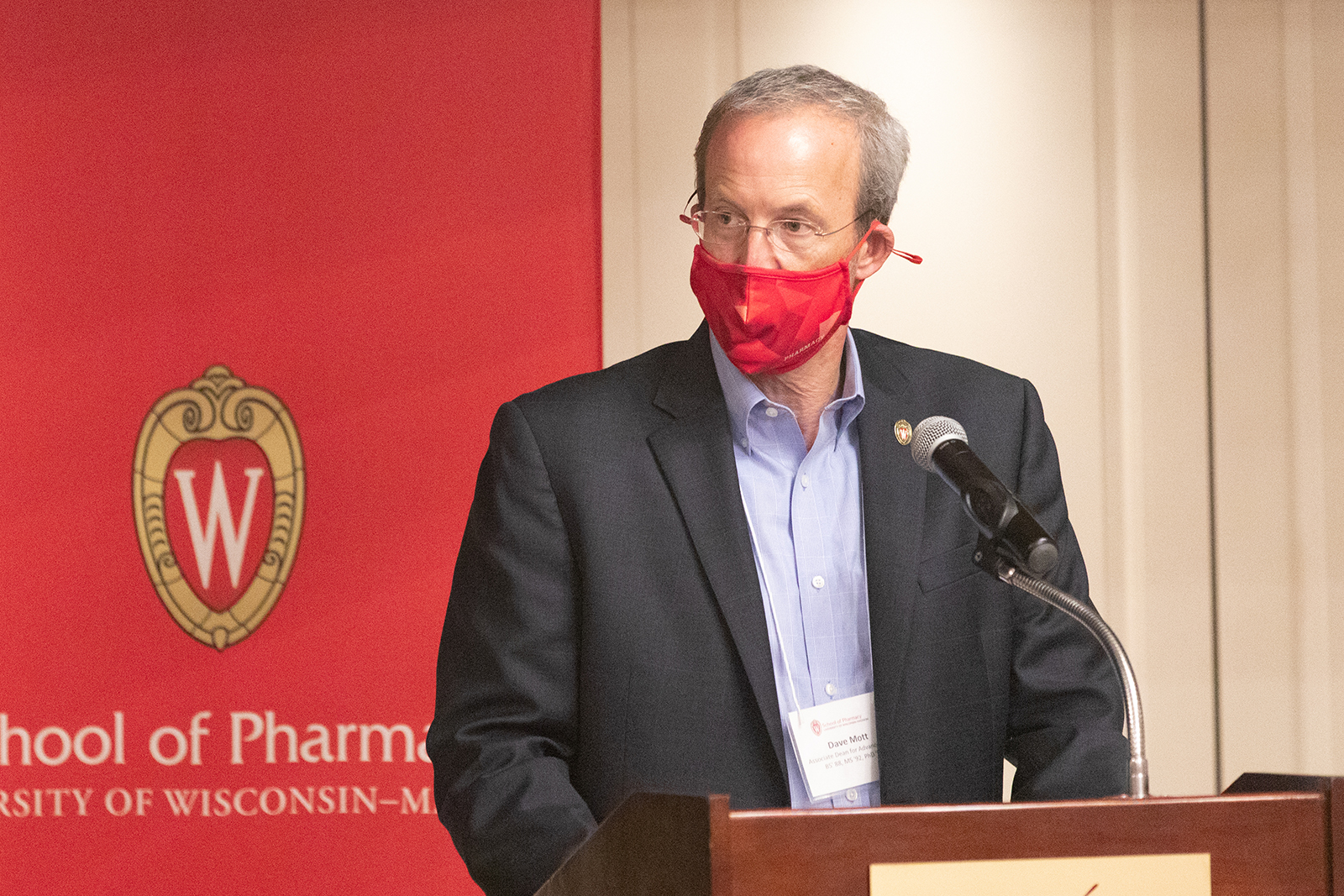 Dave Mott speaking at the podium