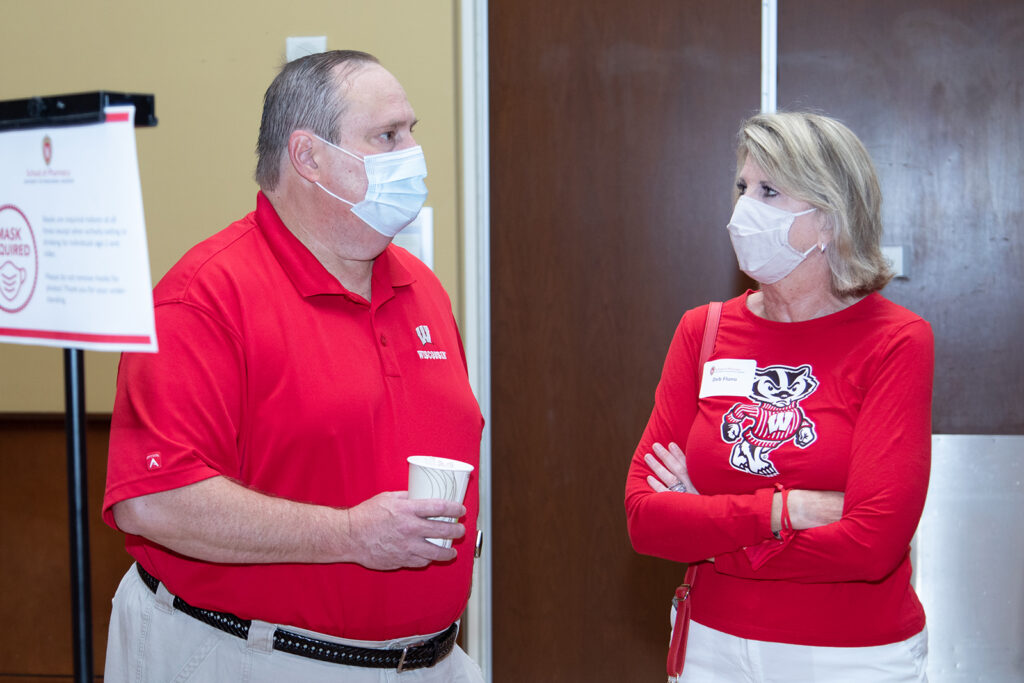 Steve Swanson and Deb Fluno together wearing Wisconsin shirts