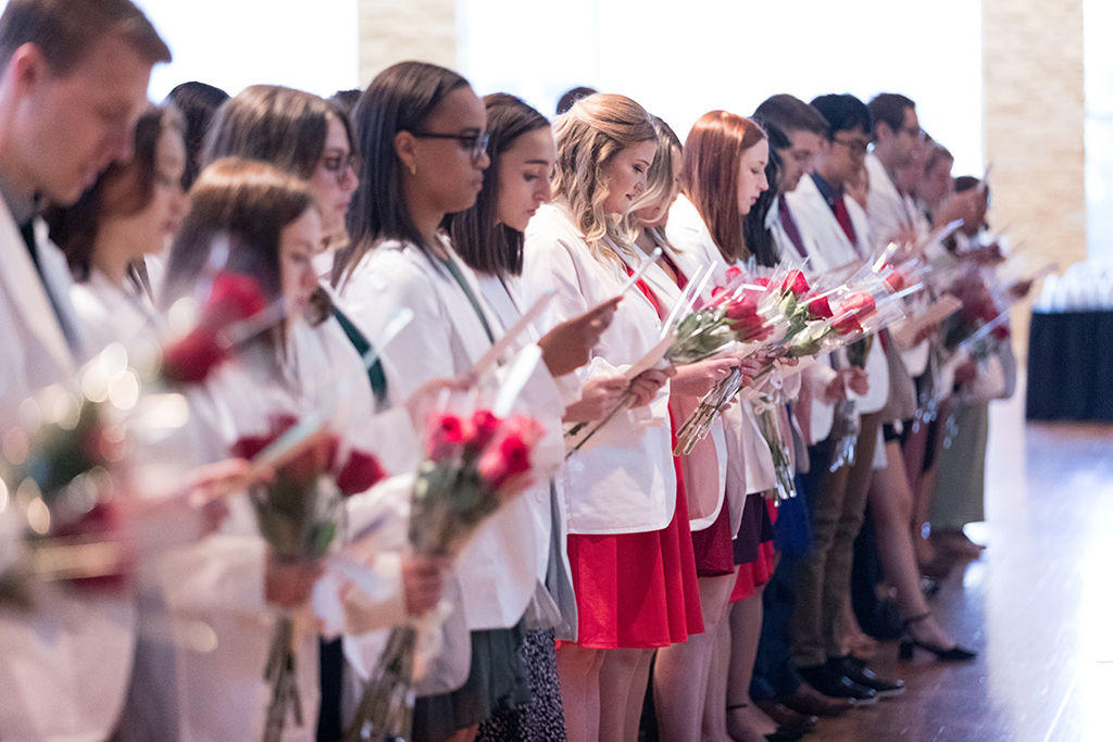 PharmD students in the Class of 2026 read the Oath of a Pharmacist at the 2022 White Coat Ceremony.