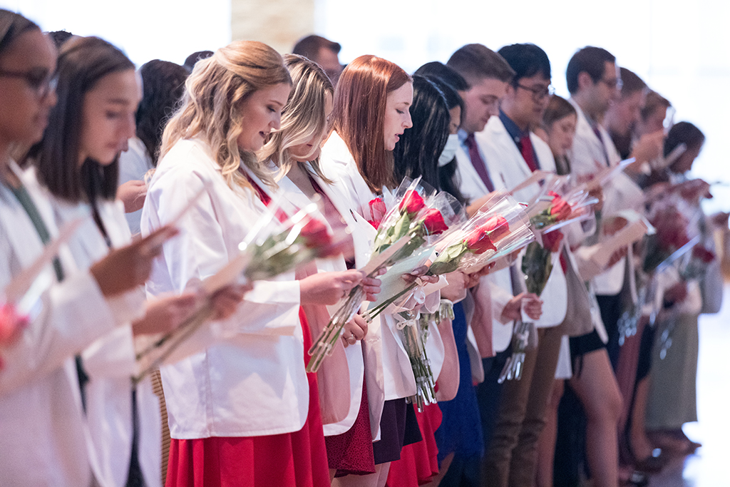 PharmD students in the Class of 2026 read the Oath of a Pharmacist at the 2022 White Coat Ceremony.