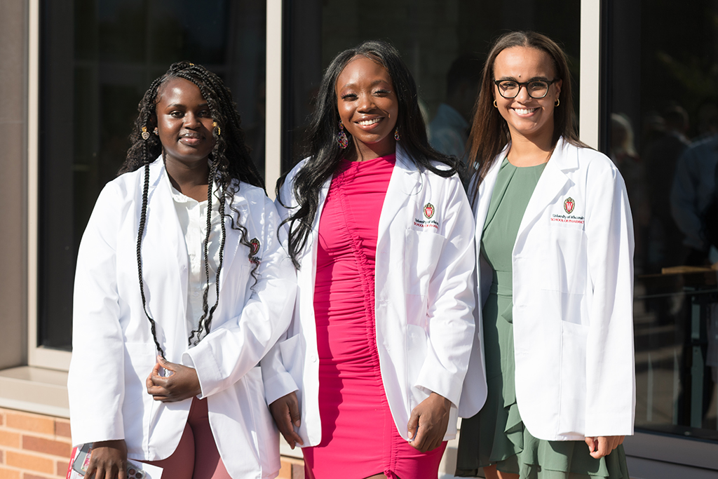 A group of students pose outside after the 2022 White Coat Ceremony.