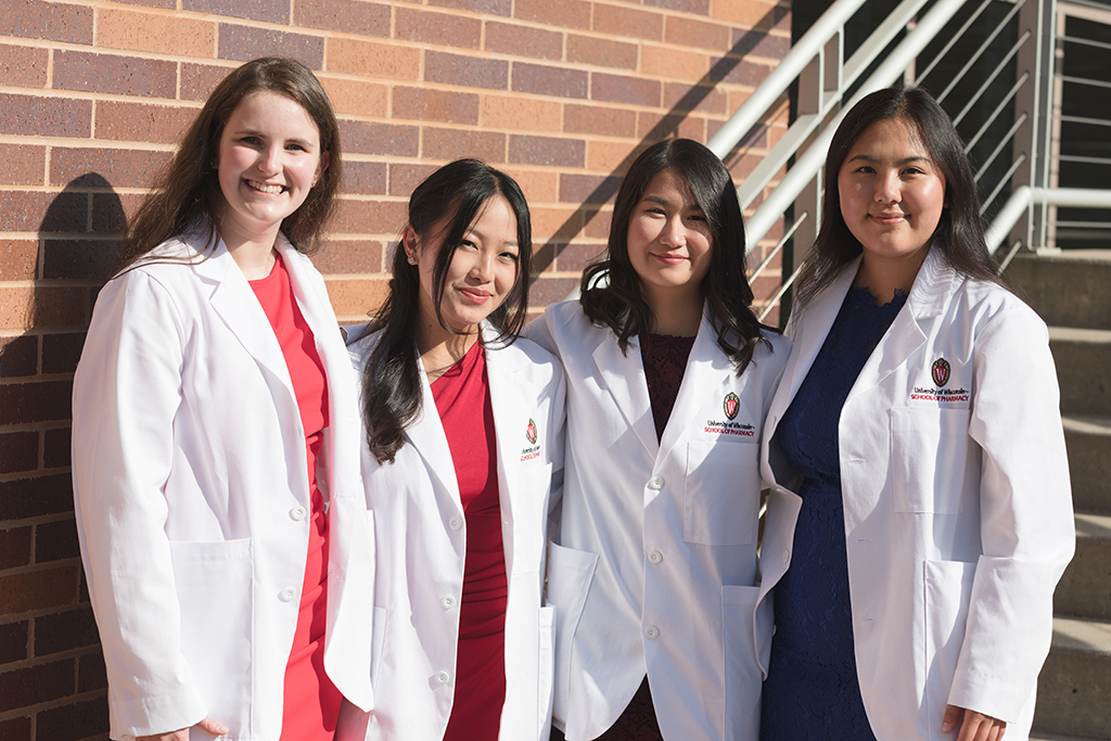 A group of students pose outside after the 2022 White Coat Ceremony.