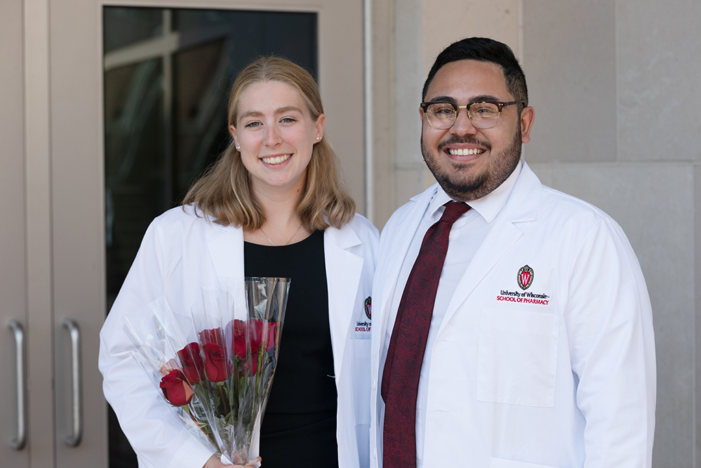 A group of students pose outside after the 2022 White Coat Ceremony.