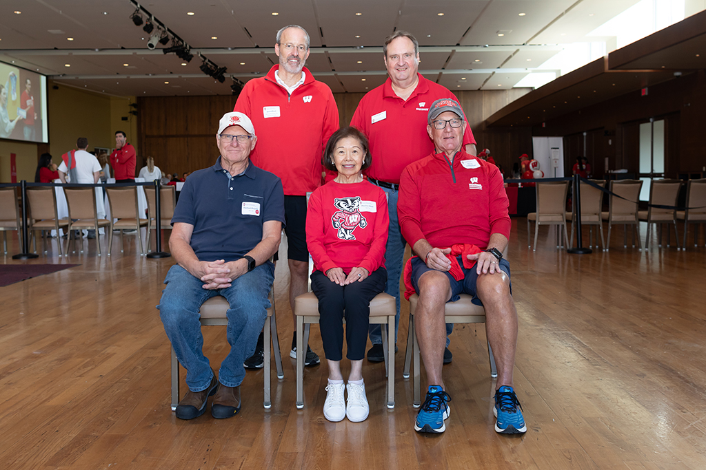 Back row: Professor Dave Mott and School of Pharmacy Dean Steve Swanson Front row: Michael Grichar, Pauline Chan, and Randy Ammerman