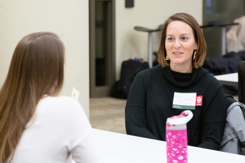 Kate Rotzenberg speaking at table